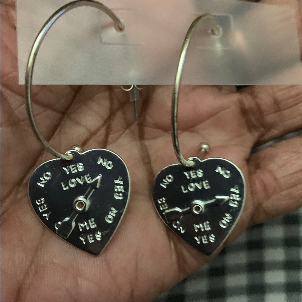 Love Earrings 
Moving Dial Heart-Shaped Hoop Earrings with Love.